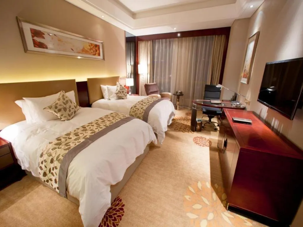 Bed in Zhengzhou Swan City International Hotel