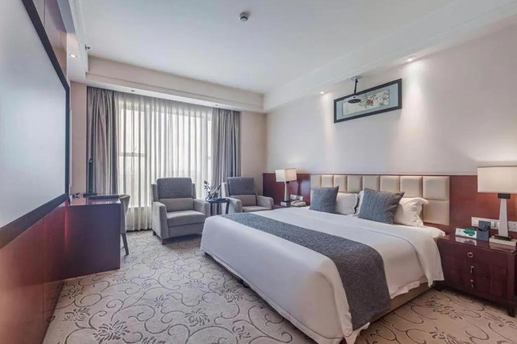 Bed in Chengdu Yinsheng International Hotel