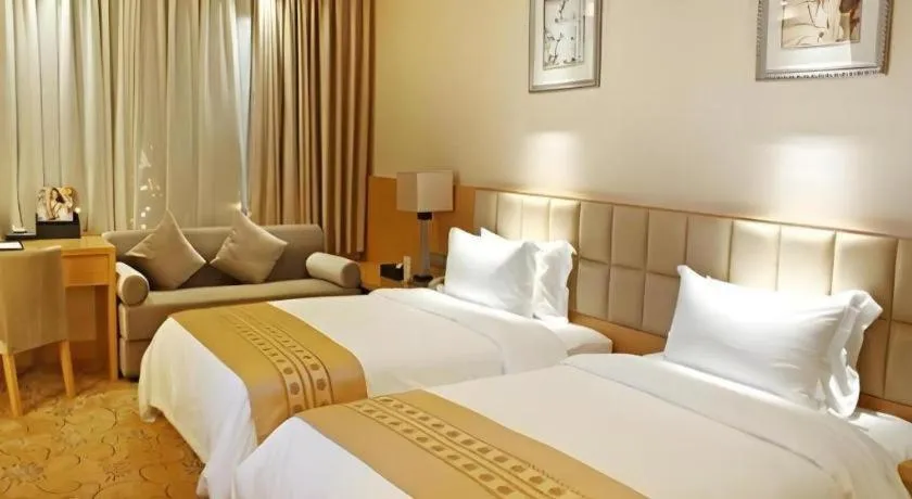 Bed in Chengdu Yinsheng International Hotel