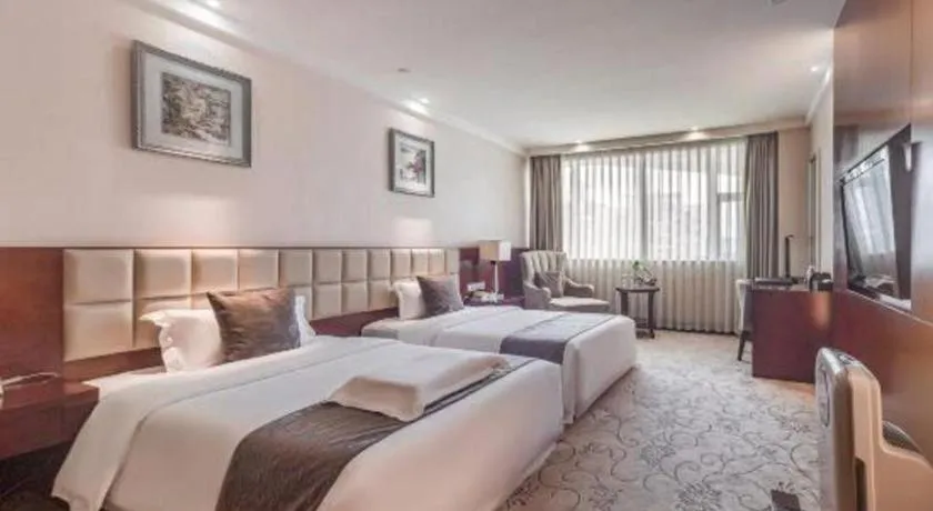 Bed in Chengdu Yinsheng International Hotel