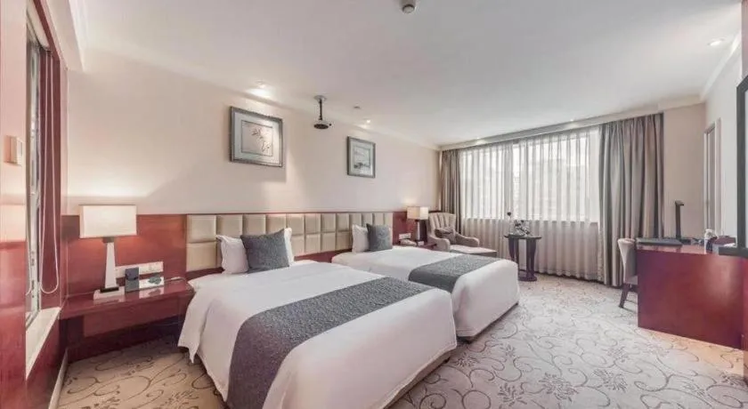 Bed in Chengdu Yinsheng International Hotel