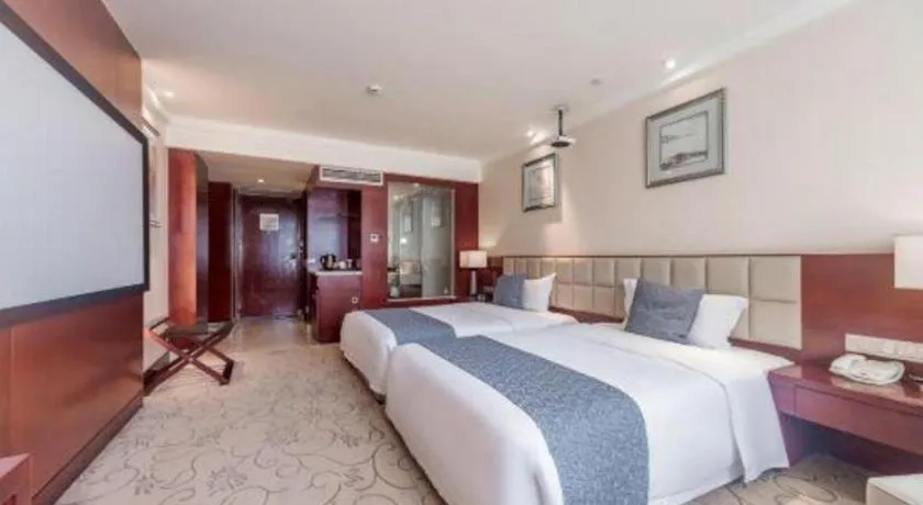 Bed in Chengdu Yinsheng International Hotel