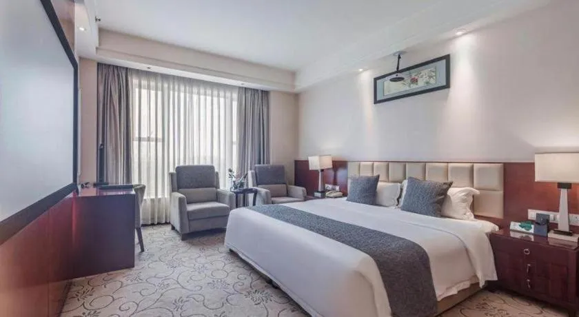 Bed in Chengdu Yinsheng International Hotel