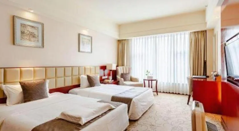 Bed in Chengdu Yinsheng International Hotel