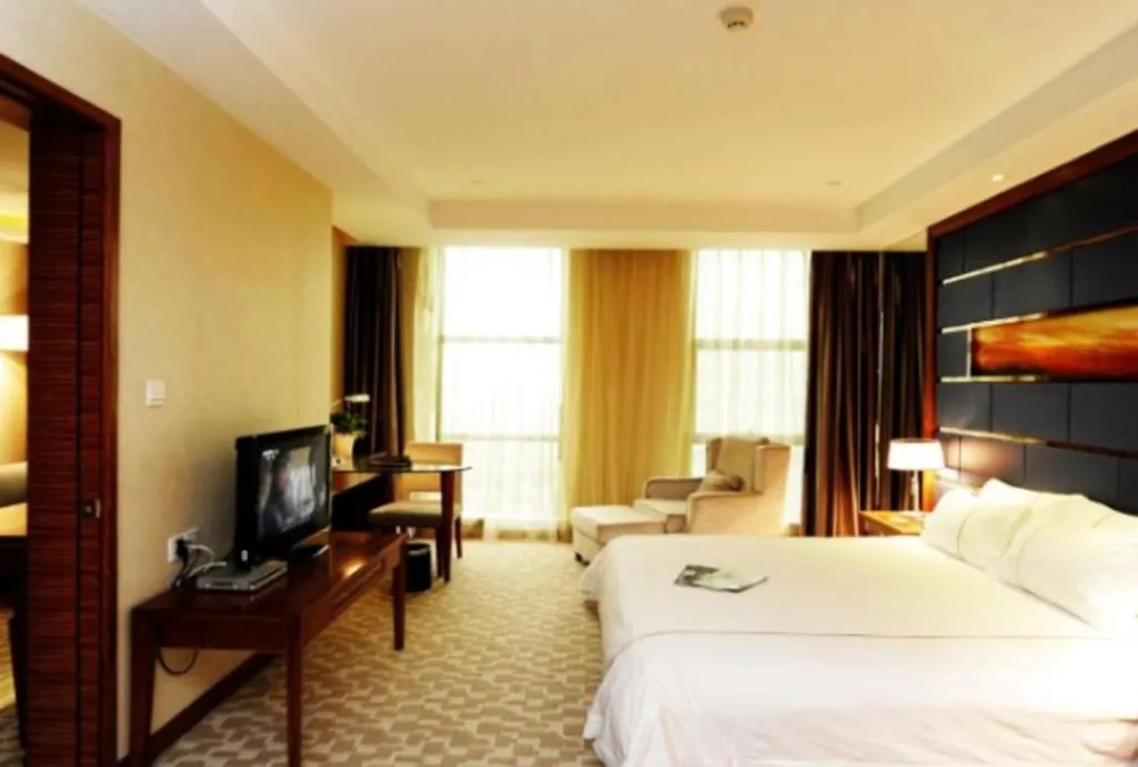 Bed in Ningbo East Shipu Hotel