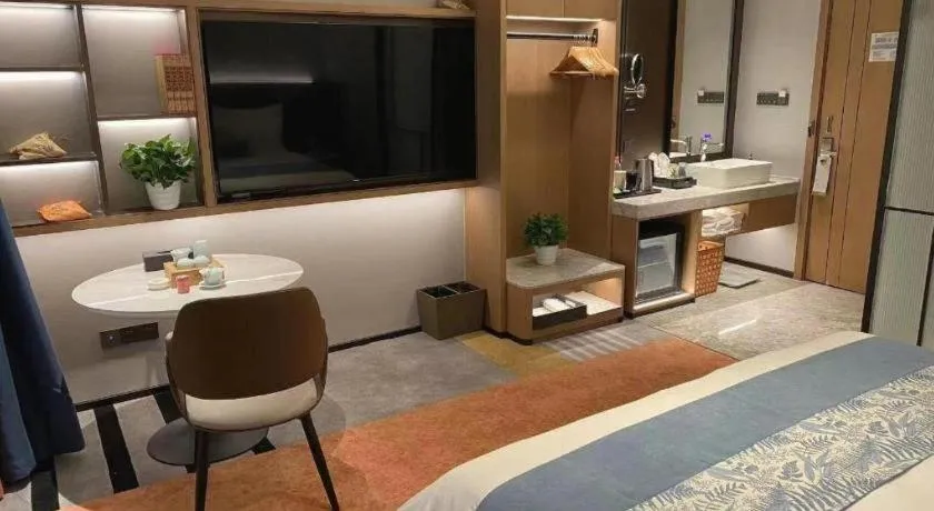 Bed in Ningbo East Shipu Hotel