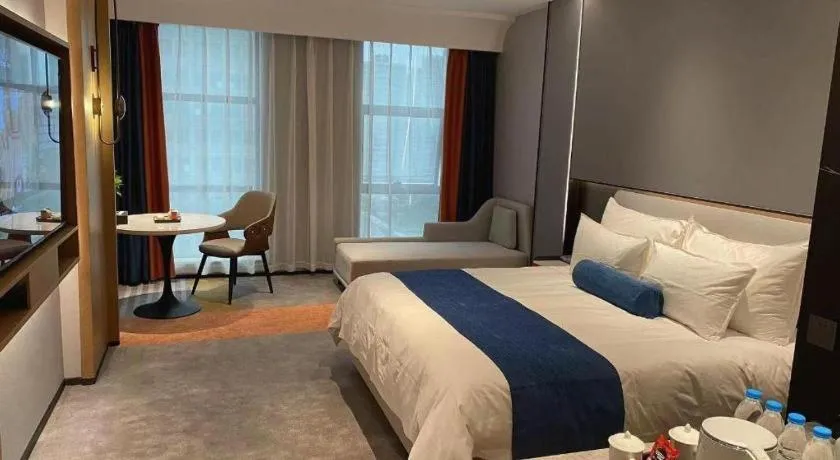 Bed in Ningbo East Shipu Hotel