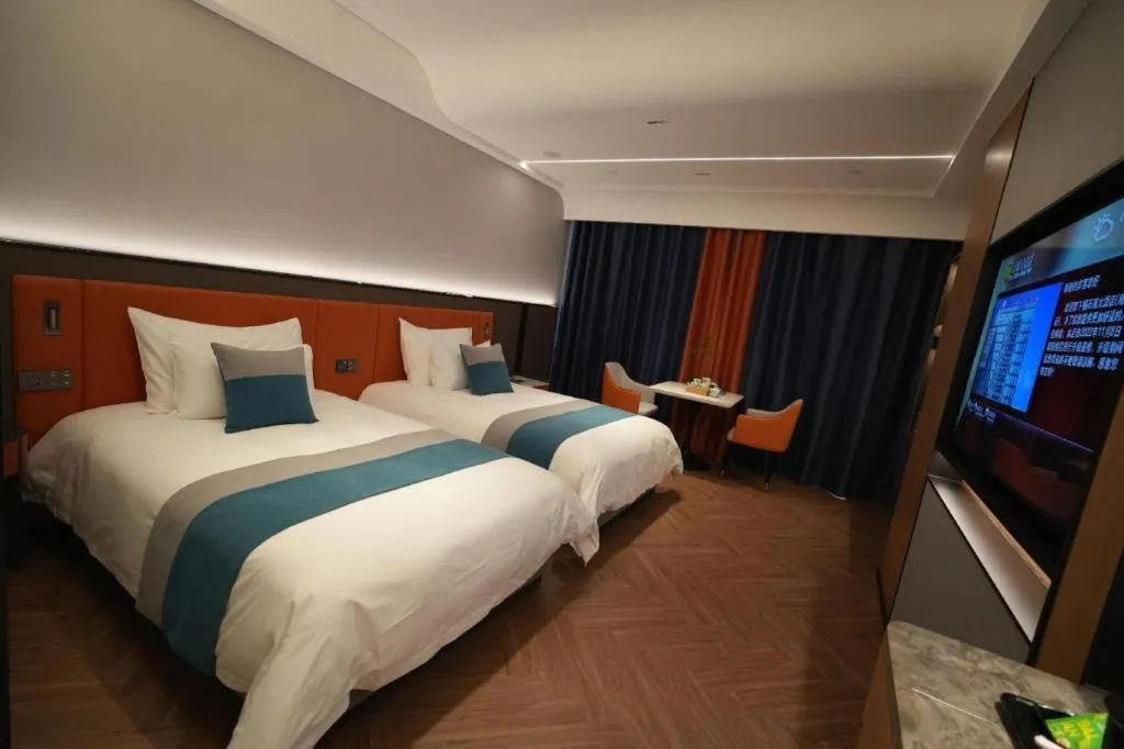 Bed in Ningbo East Shipu Hotel