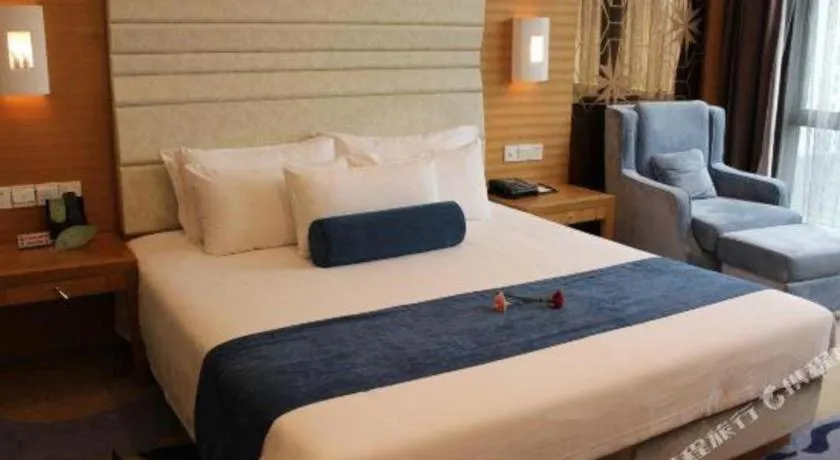 Bed in Ningbo East Shipu Hotel