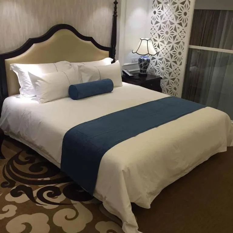 Bed in Ningbo East Shipu Hotel