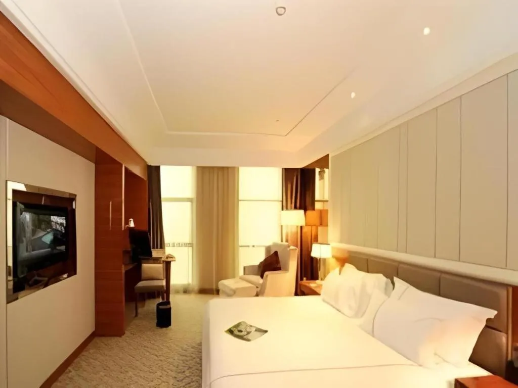 Bed in Ningbo East Shipu Hotel