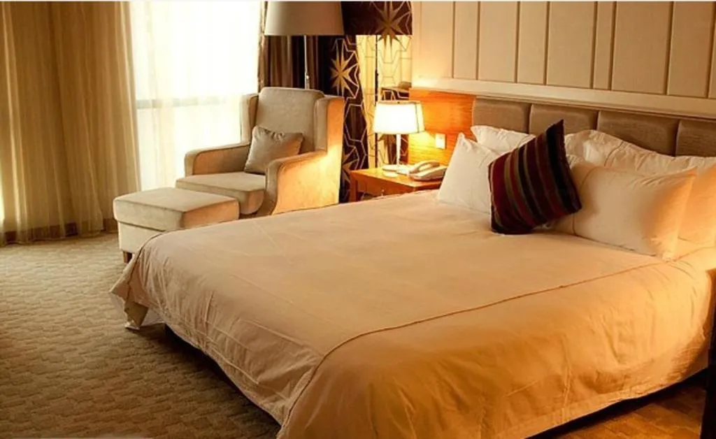 Bed in Ningbo East Shipu Hotel