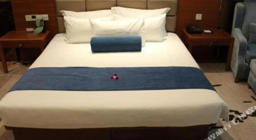 Bed in Ningbo East Shipu Hotel