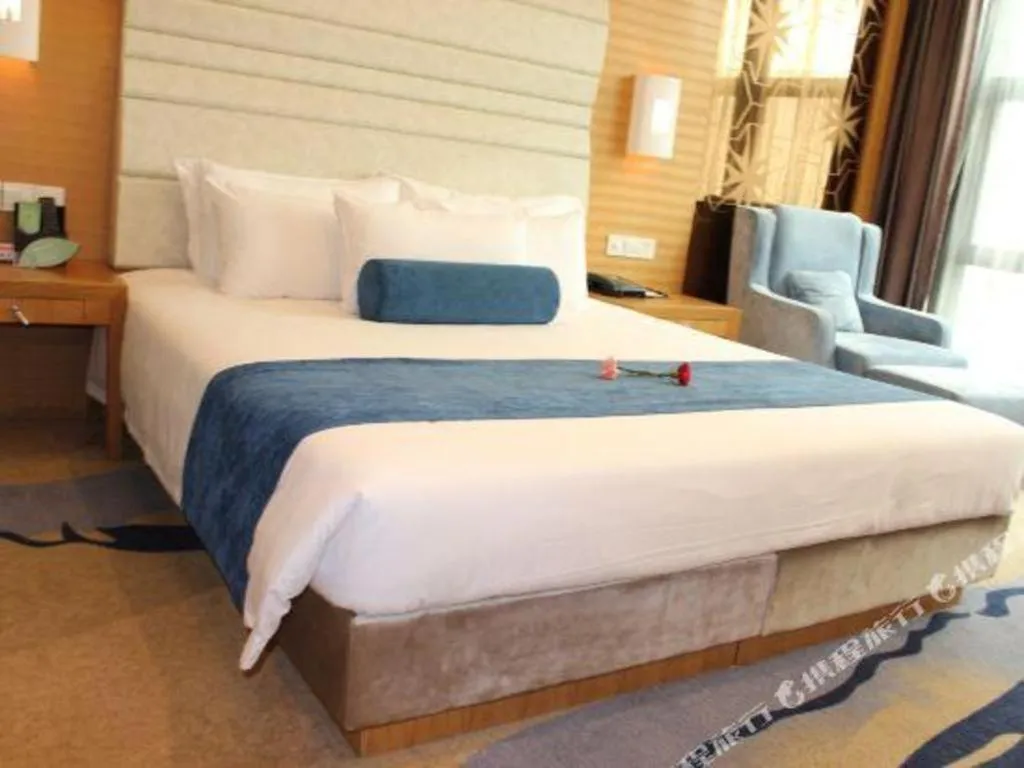 Bed in Ningbo East Shipu Hotel