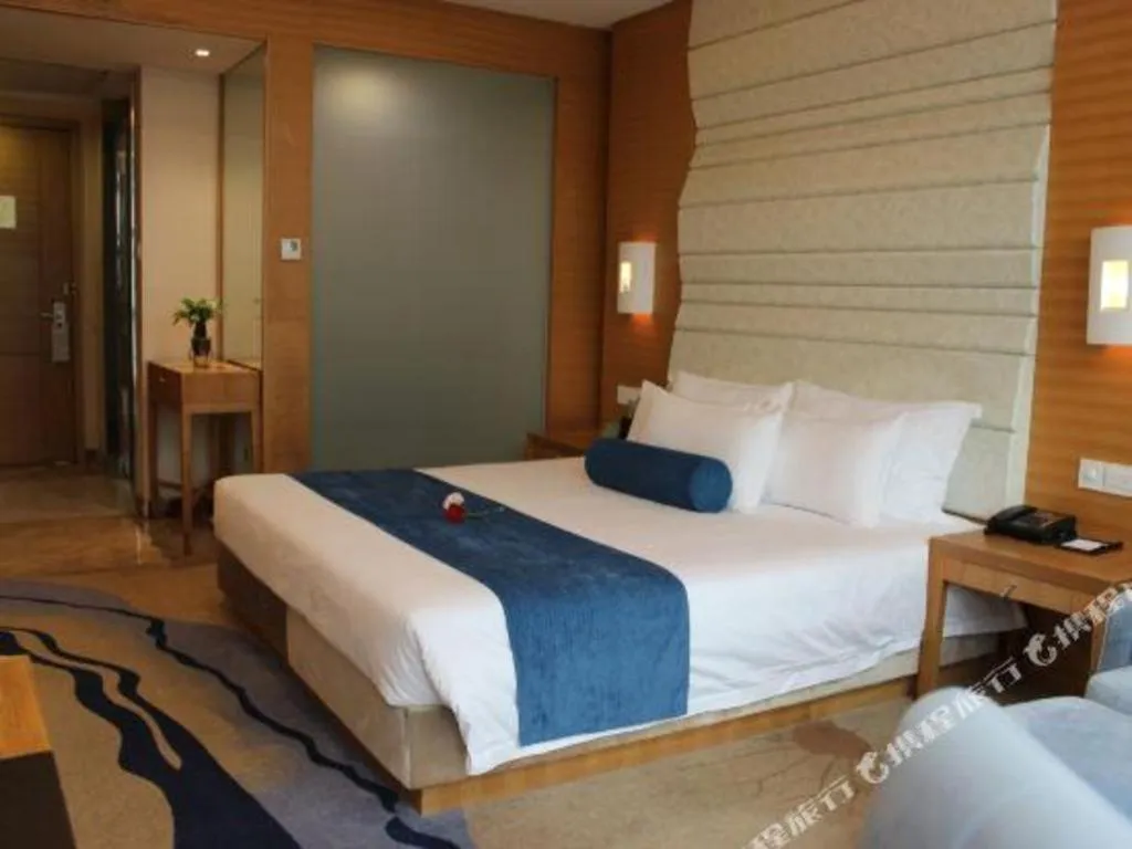 Bed in Ningbo East Shipu Hotel