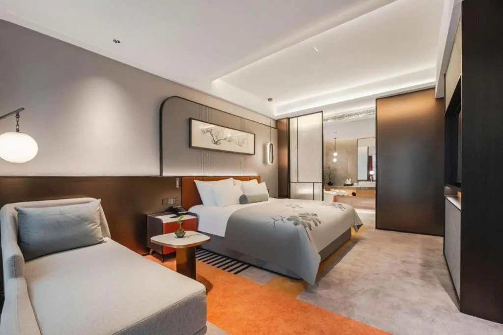 Bed in Ningbo East Shipu Hotel