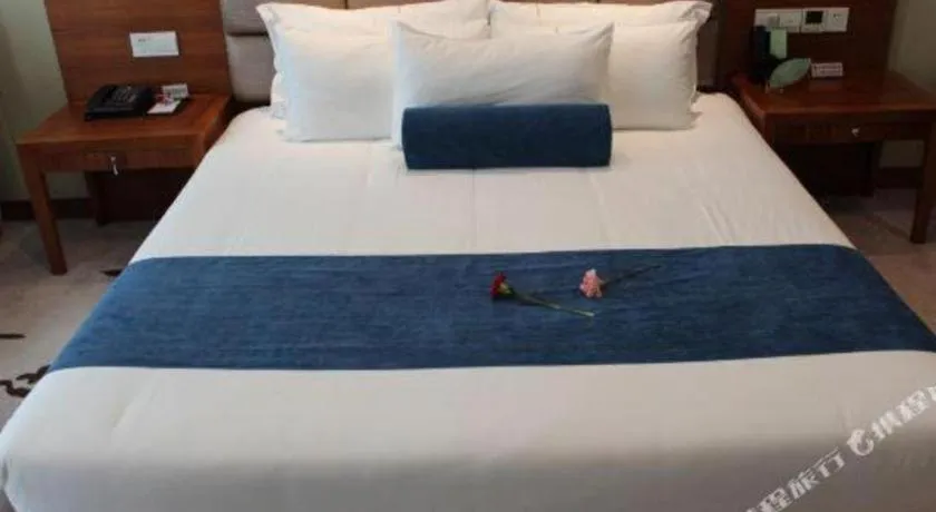 Bed in Ningbo East Shipu Hotel