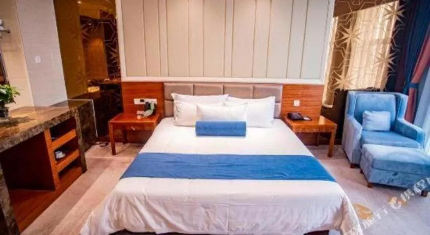 Bed in Ningbo East Shipu Hotel