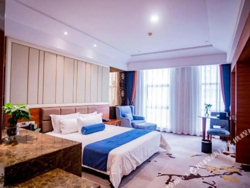 Bed in Ningbo East Shipu Hotel