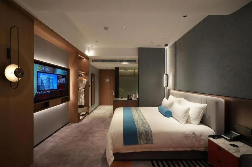 Bed in Ningbo East Shipu Hotel