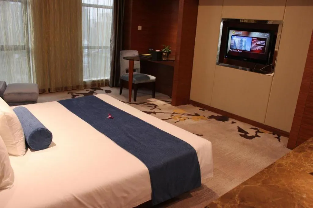 Bed in Ningbo East Shipu Hotel