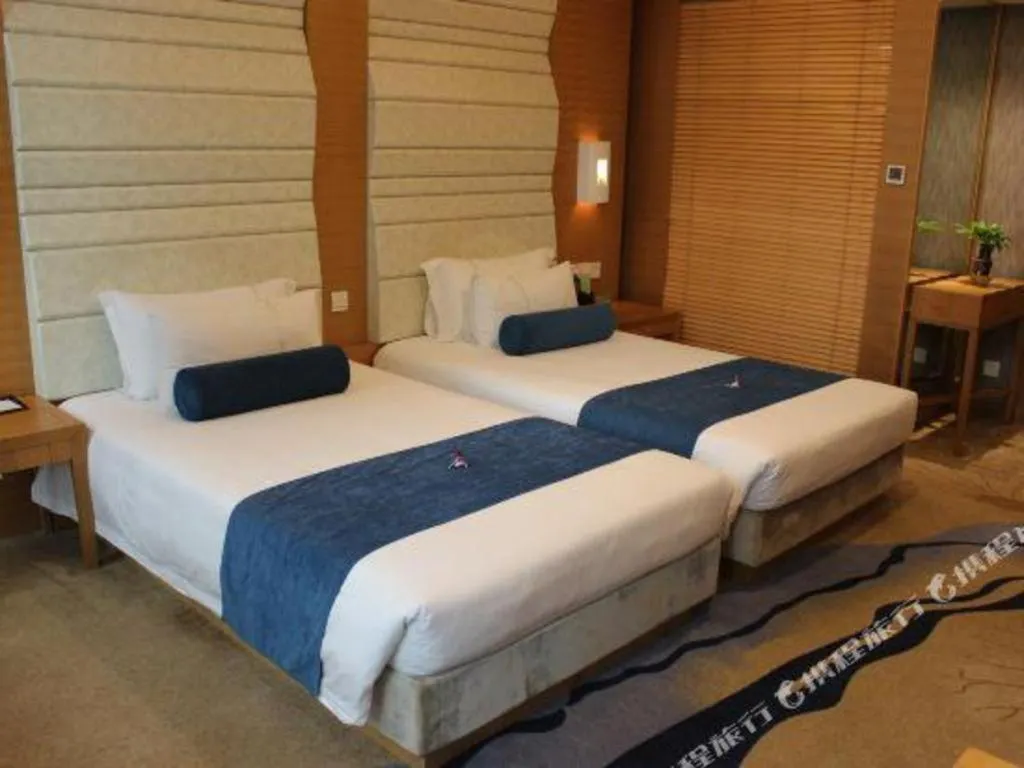 Bed in Ningbo East Shipu Hotel