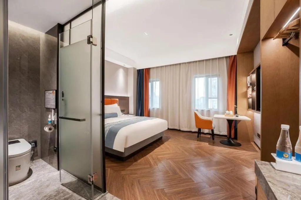 Bed in Ningbo East Shipu Hotel