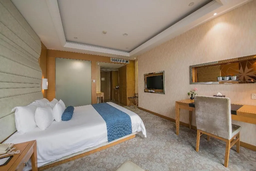 Bed in Ningbo East Shipu Hotel