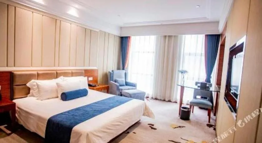 Bed in Ningbo East Shipu Hotel