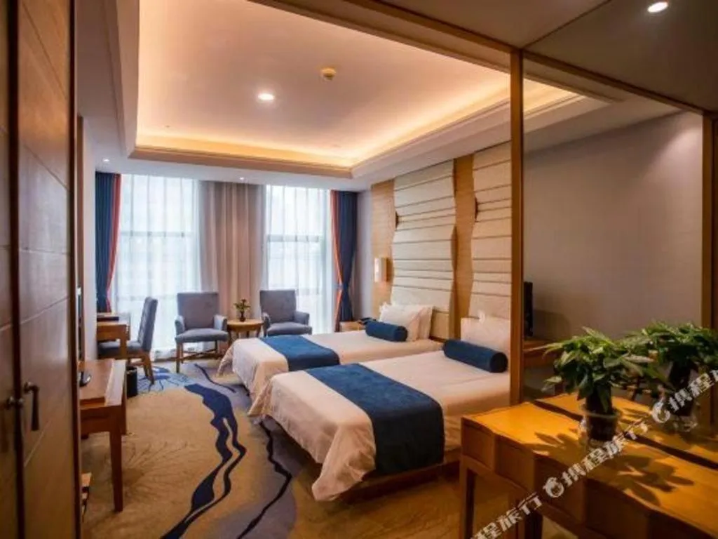 Bed in Ningbo East Shipu Hotel