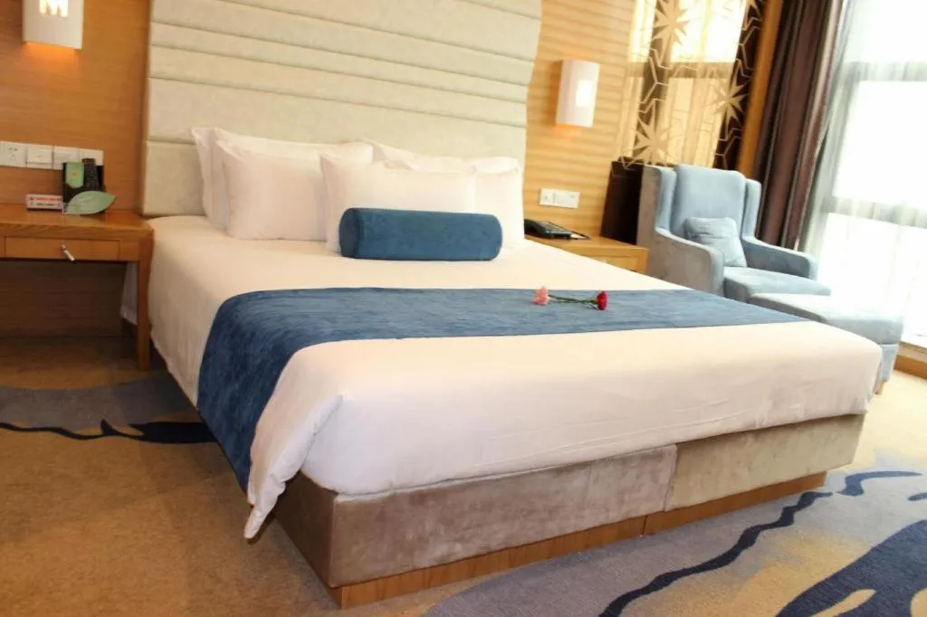 Bed in Ningbo East Shipu Hotel