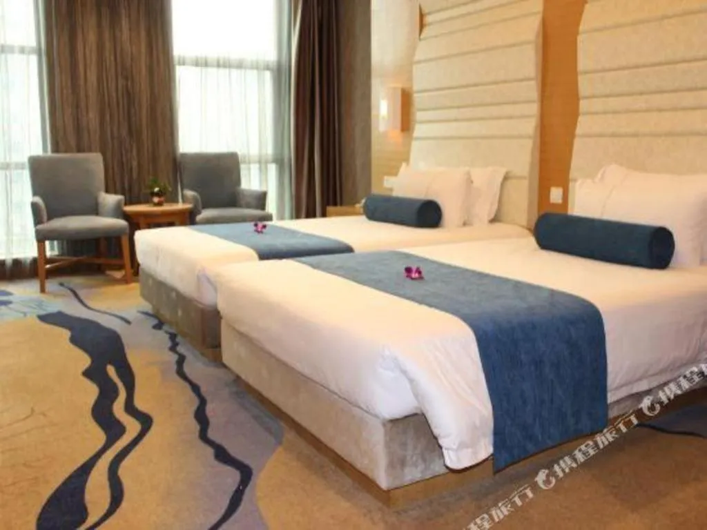 Bed in Ningbo East Shipu Hotel