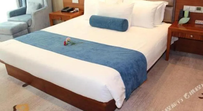 Bed in Ningbo East Shipu Hotel