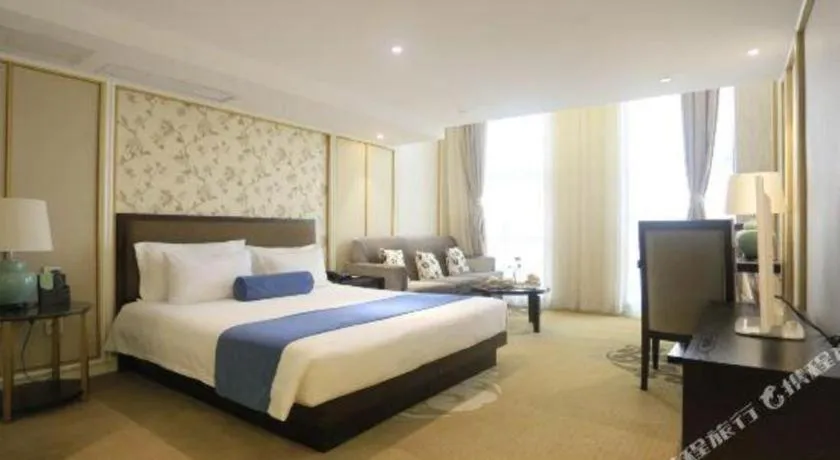 Bed in Ningbo East Shipu Hotel