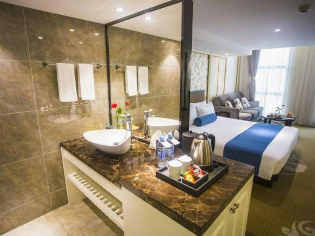 Bed in Ningbo East Shipu Hotel