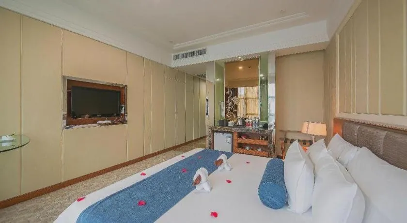 Bed in Ningbo East Shipu Hotel