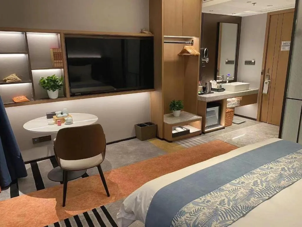 Bed in Ningbo East Shipu Hotel