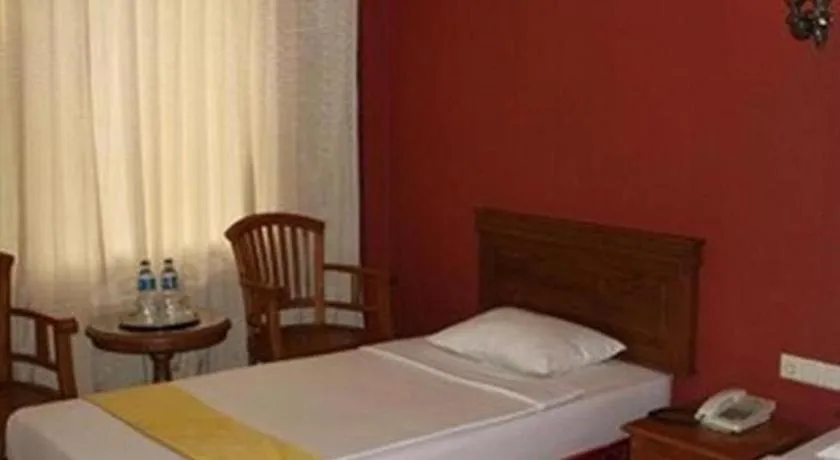 Bed in Lintas Sumatra Hotel