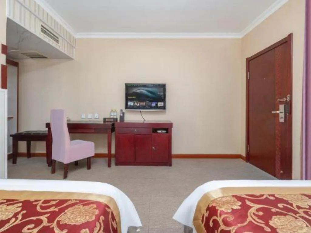 Bed in Weihai Huayu Business Hotel