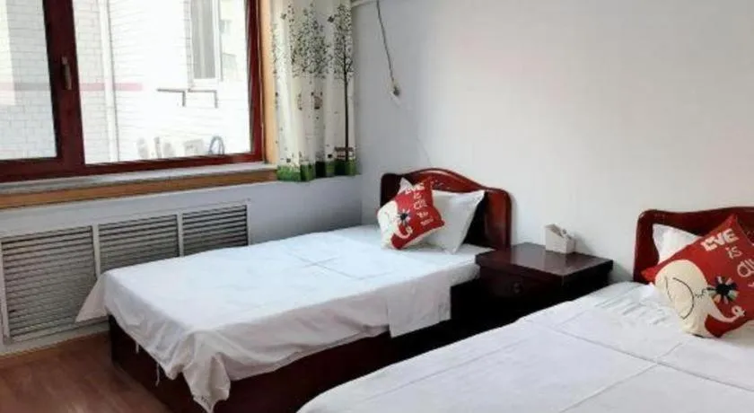 Bed in Weihai Huayu Business Hotel