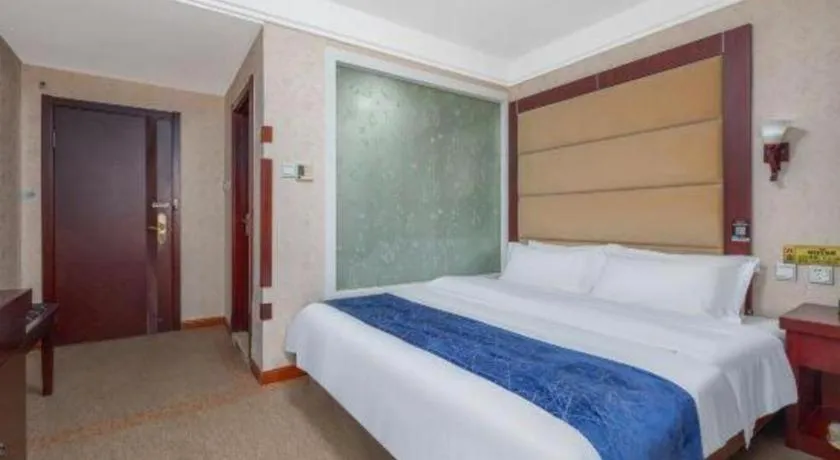 Bed in Weihai Huayu Business Hotel