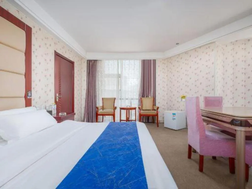 Bed in Weihai Huayu Business Hotel