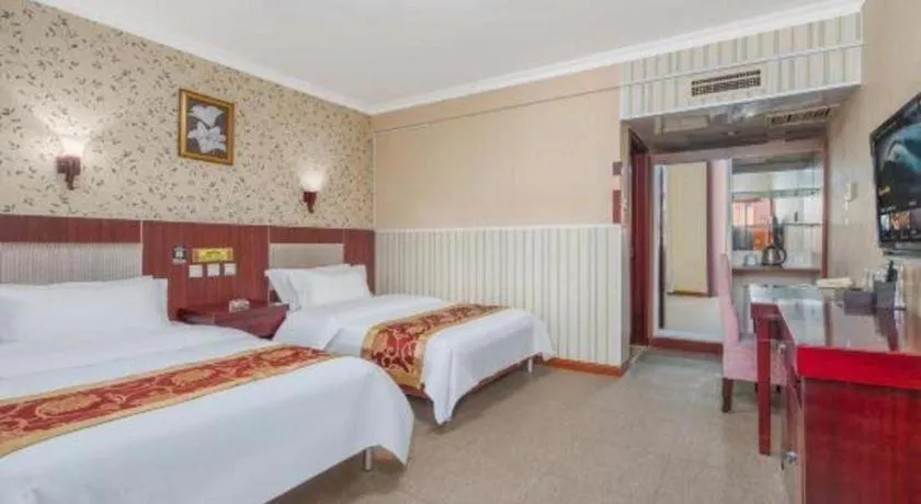 Bed in Weihai Huayu Business Hotel