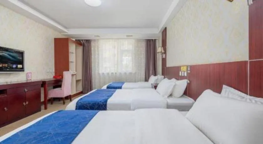 Bed in Weihai Huayu Business Hotel