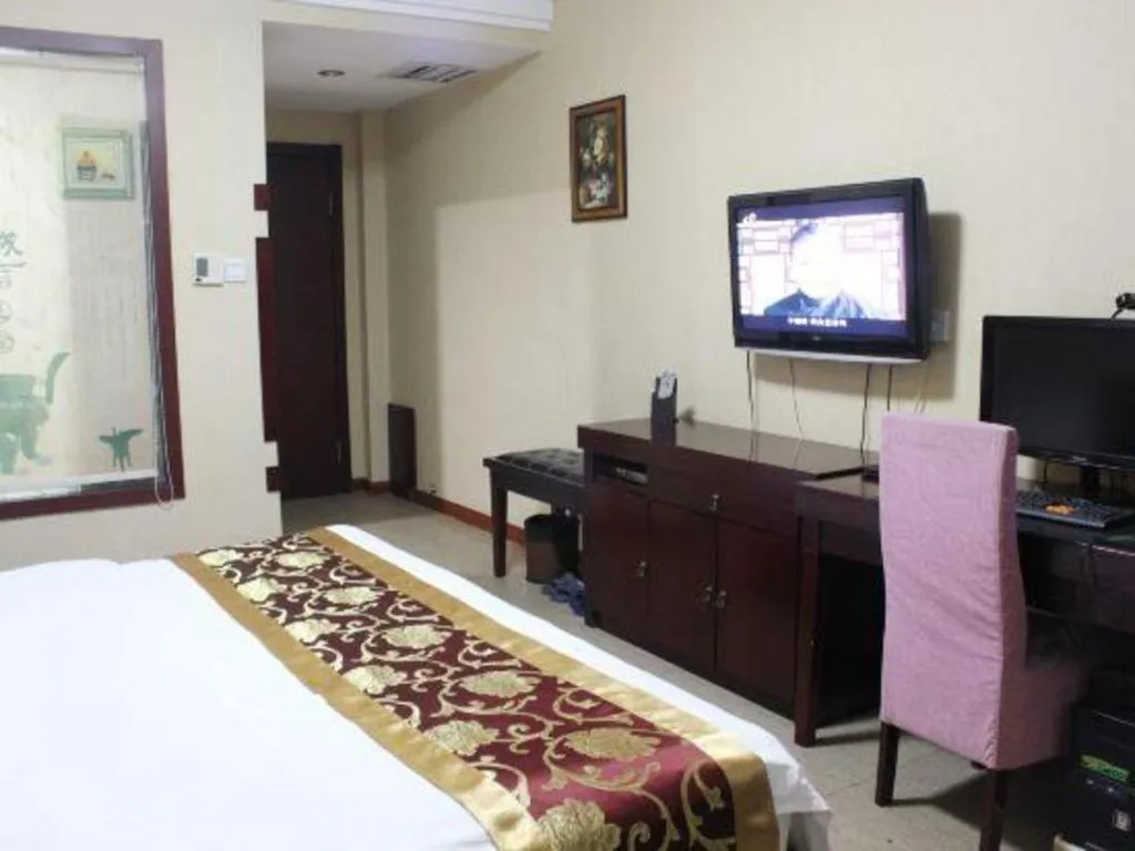 Bed in Weihai Huayu Business Hotel