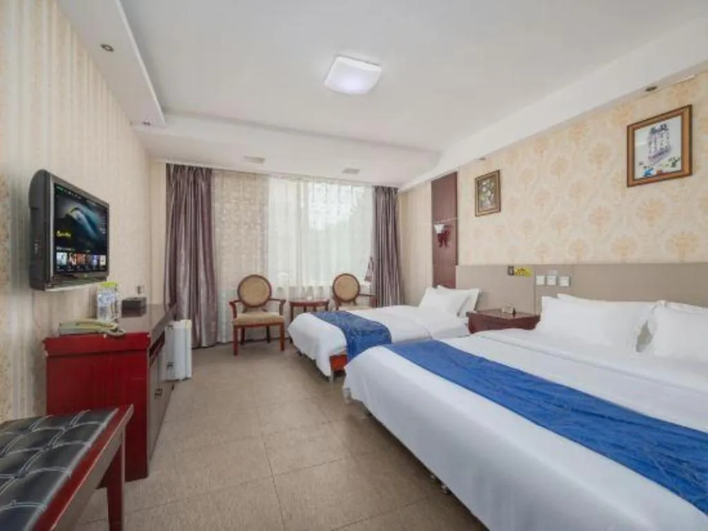 Bed in Weihai Huayu Business Hotel