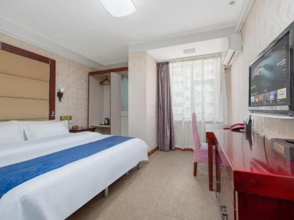 Bed in Weihai Huayu Business Hotel