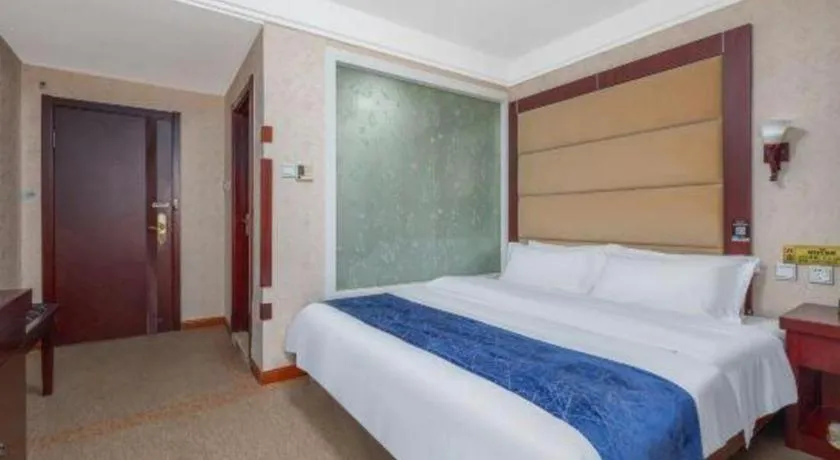 Bed in Weihai Huayu Business Hotel