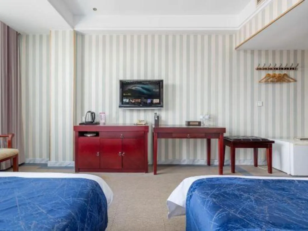 Bed in Weihai Huayu Business Hotel