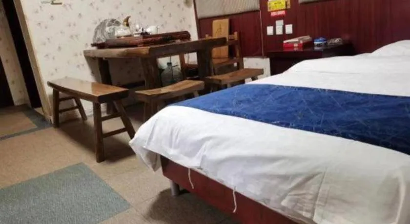 Bed in Weihai Huayu Business Hotel